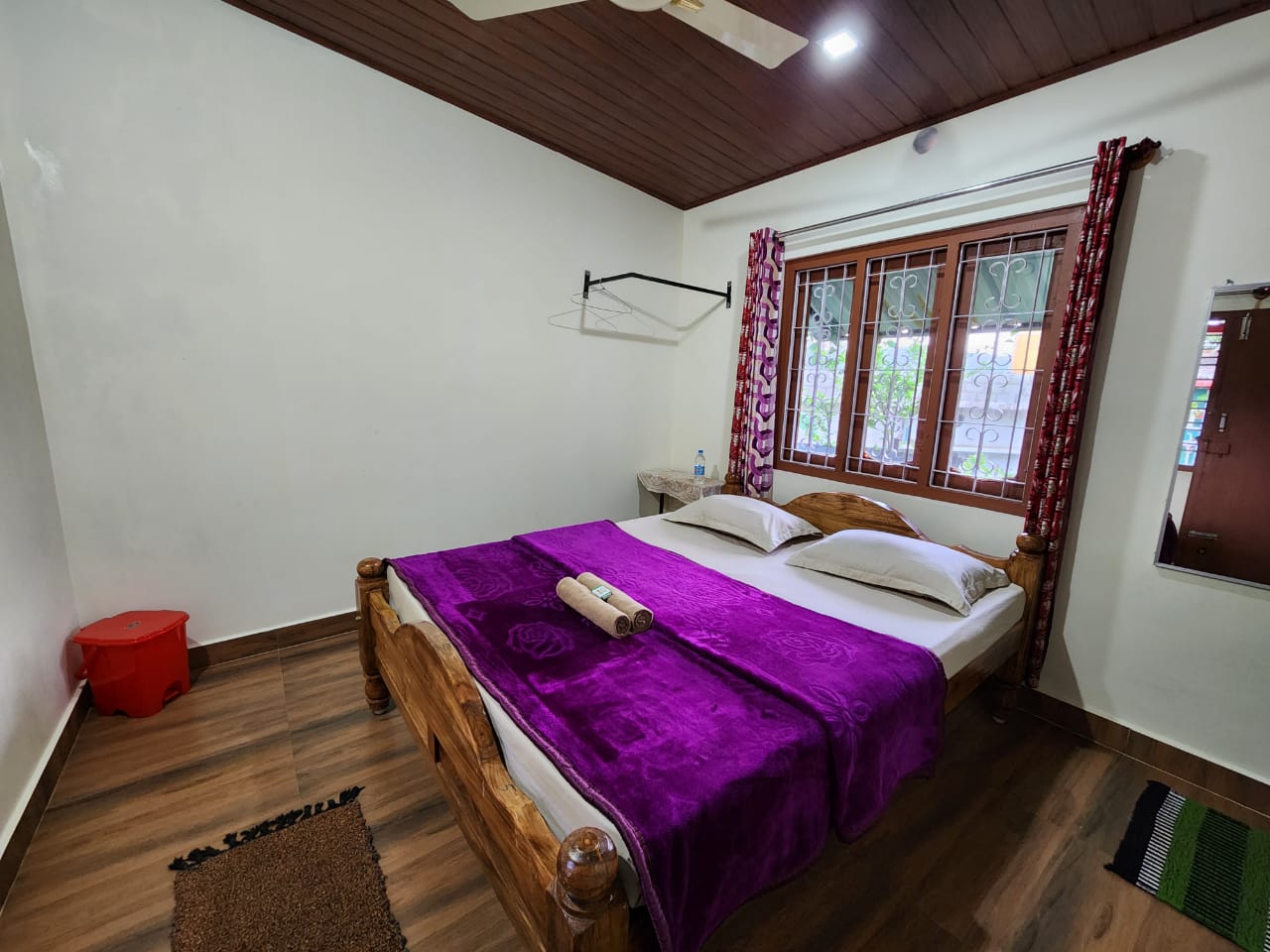 Bedroom with wooden ceiling